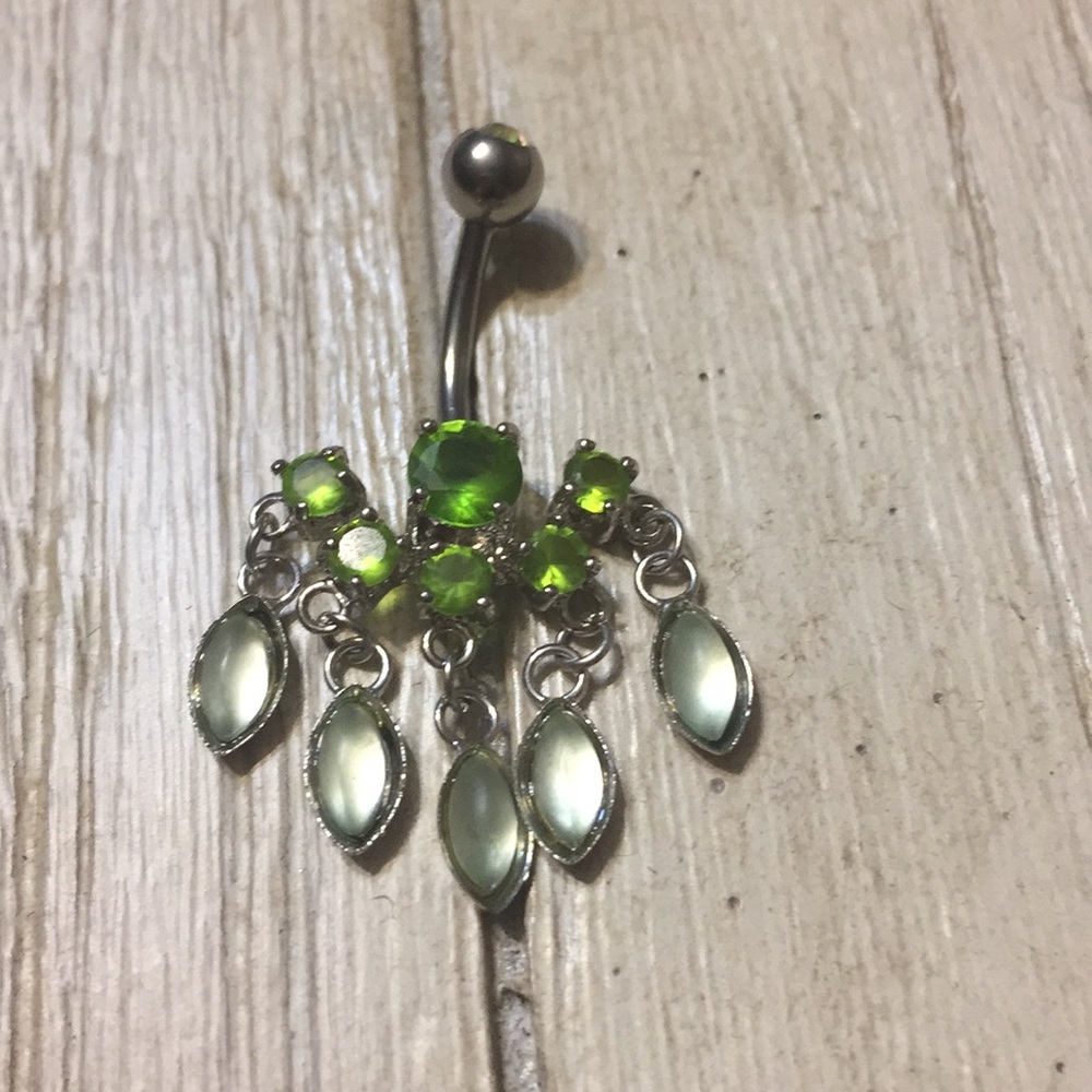 Green dangling belly ring